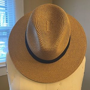 Women’s beach hat. Not sure of brand. OS. Adjustable inside. Tan and black.